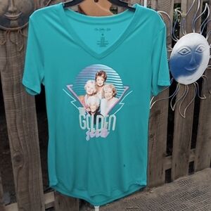 Woman shirt new with no tags very stretchy. Golden girls. Size small.